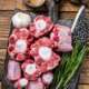 Raw,Beef,Oxtail,Cut,Meat,On,Wooden,Cutting,Board,With